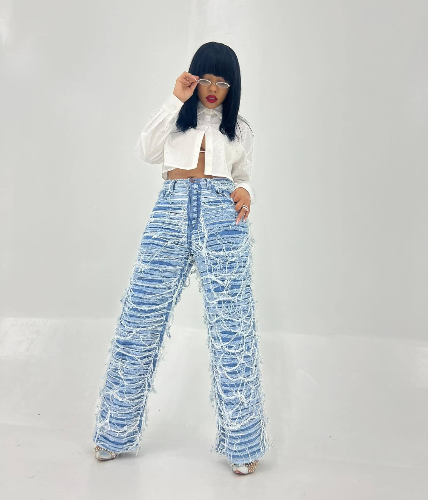 25 Edition – Women’s High Waist Ripped Tassel Denim Pants